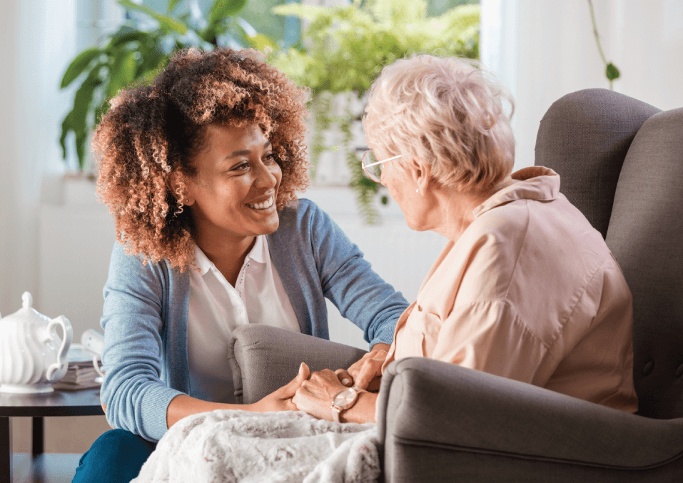 senior talking to nurse