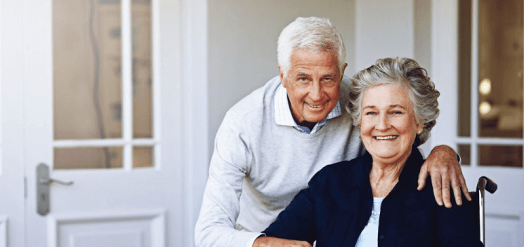 senior woman in wheelchair with husband