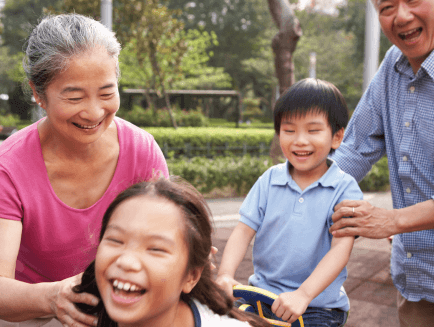 Grandparents playing with their grandkids