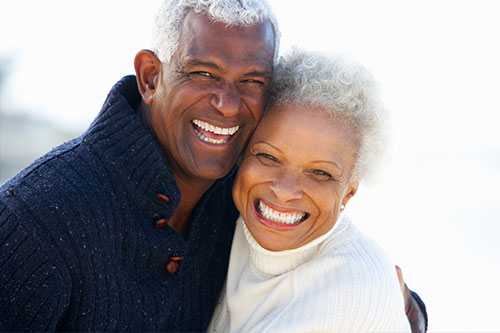 senior couple posing for the camera