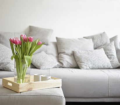 couch and ottoman with flowers