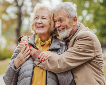 Senior couple hugging