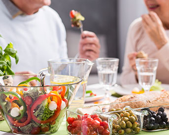 healthy salad ingredients spread out on a table